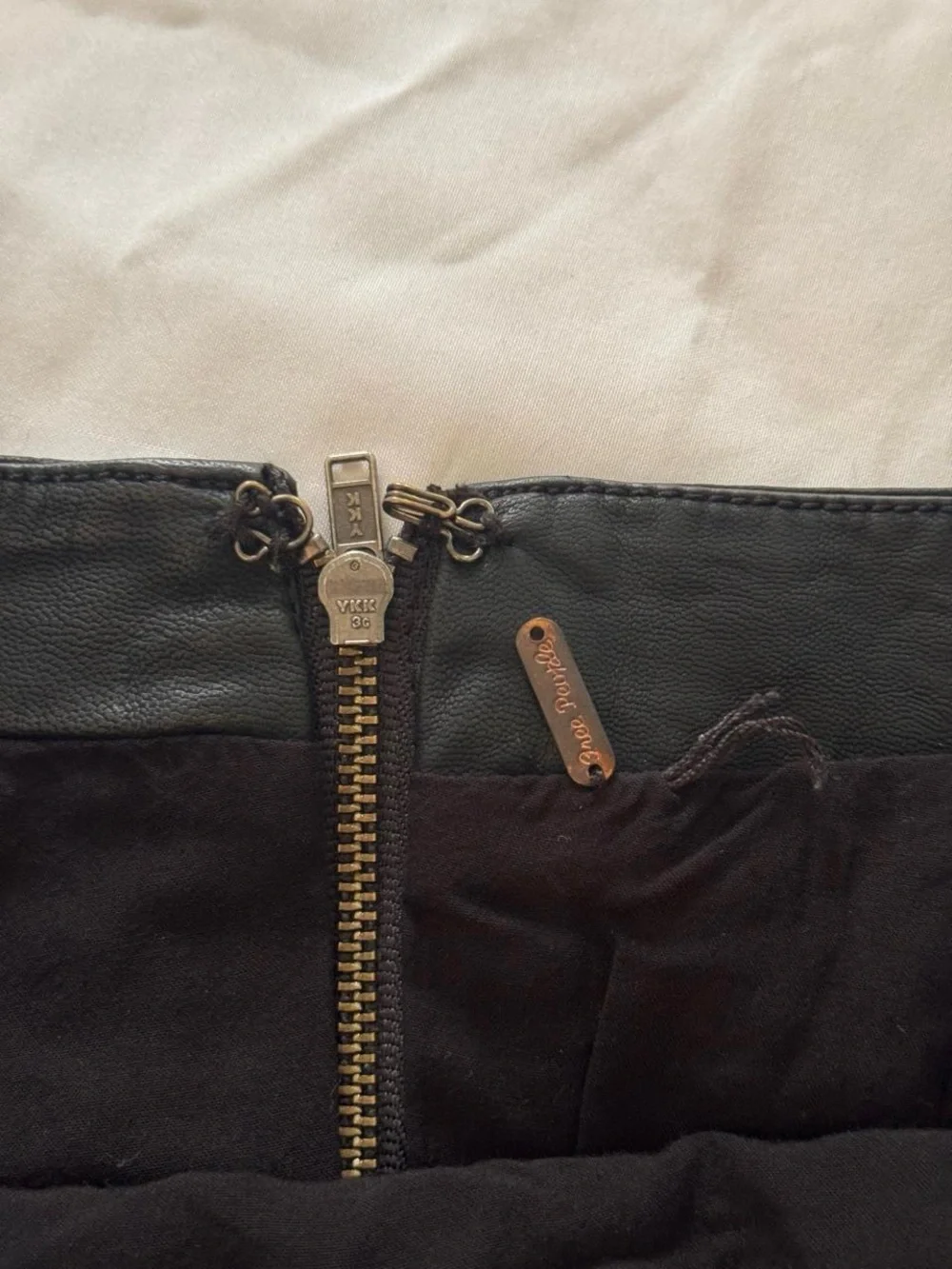 Free People black faux leather mini skirt- Size 6